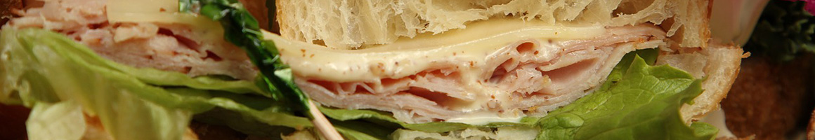 Eating Sandwich at Sandwichery restaurant in Redding, CA.